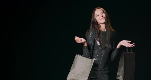 A Black Friday Shopper with Shopping Bags