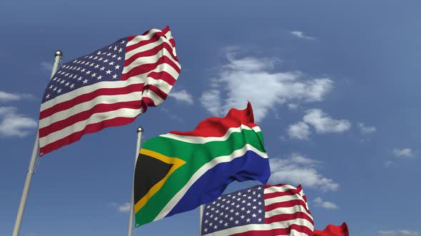 Row of Waving Flags of South Africa and the USA