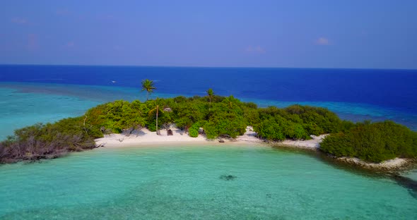 Island In Hawaii - Lush Crescent-shaped Island On White Sand Surrounded By Bright Blue Shallow Sea W