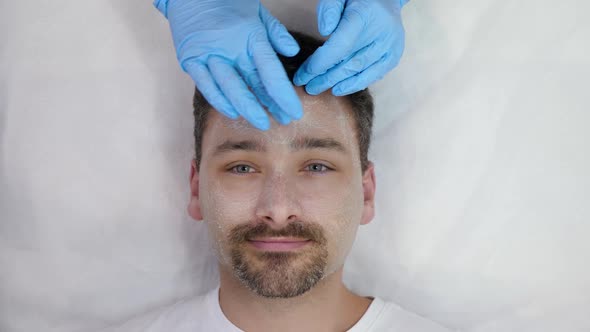 Beautician Doing Massage with Scrub