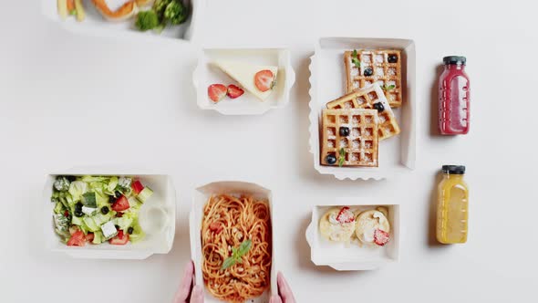 Food Delivery Top View Take Away Meals in Disposable Containers on White Background