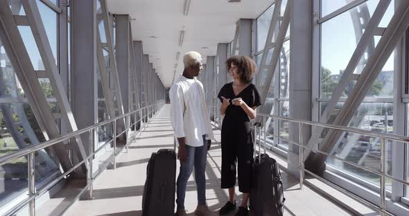 Afro American Couple Young Family on Their Honeymoon Two Friends Man and Woman Stand in Airport