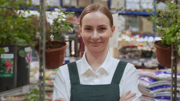 Store Manager Demonstrates Big Garden Department Closeup