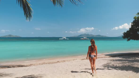 Woman Walking Tropical Beach
