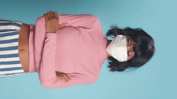 Vertical Video of Unhappy Woman Wears Protective Mask Being Affected Coronavirus