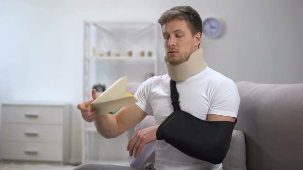 Man in Foam Cervical Collar and Arm Sling Opening Envelope With Bill, High Price