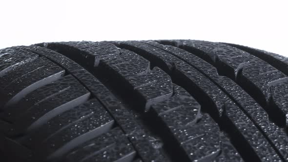 Sparkling Raindrops On A Car Tire