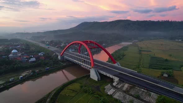 Aerial view of the Kalikuto Bridge, an Iconic Red Bridge at Trans Java Toll Road