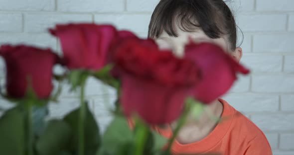 Red Roses for Smiling Child