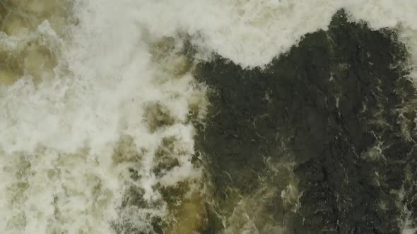 Fast white water rapids Tobey Fall, Maine. TOP DOWN AERIAL 4K