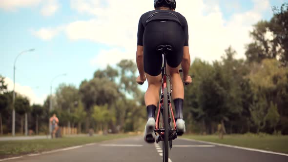 Cyclist Fitness Riding On Road Bike.Cyclist Triathlete Training Workout On Bicycle.Cycling On Bike