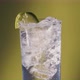 Lime added to a Soda water or a Sprite spinning glass, slow motion bubbles. - VideoHive Item for Sale