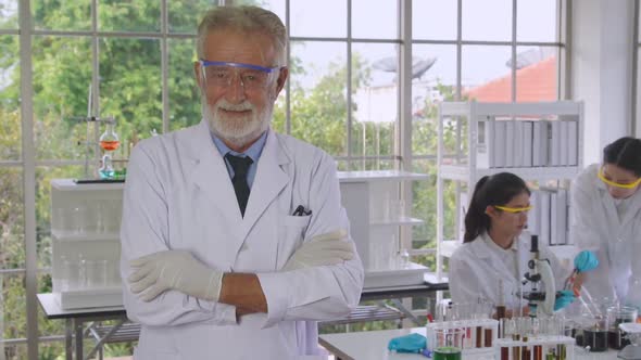 Scientist Work with Science Equipment in Laboratory