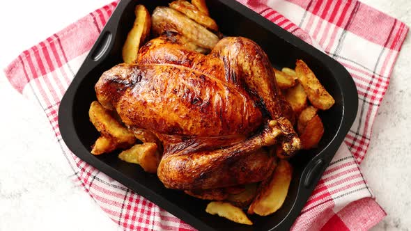 Roasted Chicken or Turkey with Potatoes in Black Steel Mold