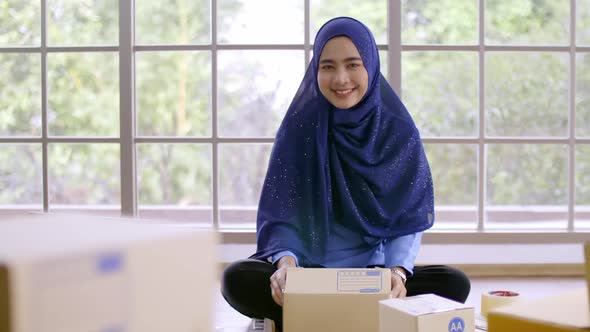 A young Muslim woman who started a small business. freelance entrepreneur working from home