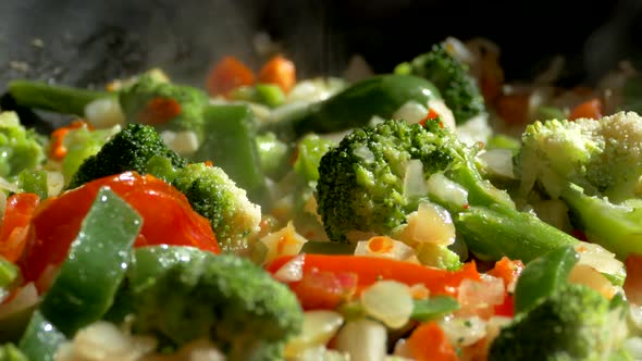 Lunch of Vegetables. Cook the Vegetable Stew in a Pan. Frozen Vegetables on a Salad. Semi-finished