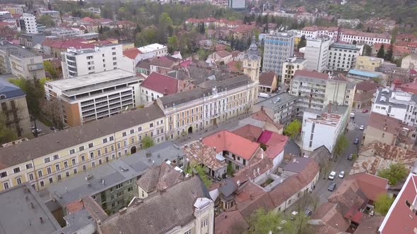 Wide Establishing Aerial Drone Shot of the Beautiful Romanian city of Cluj Napoca.