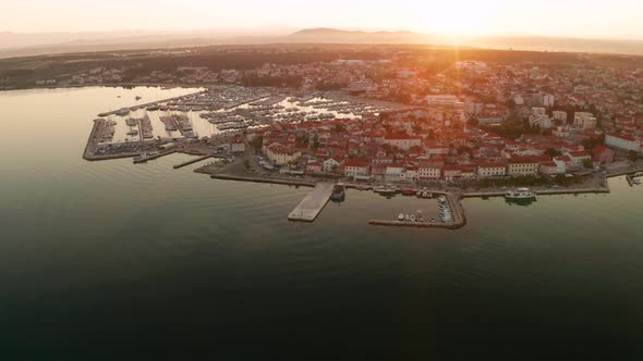 Aerial View of Ferry Near Old Town of Biograd Na Moru in Croatia at Sunset