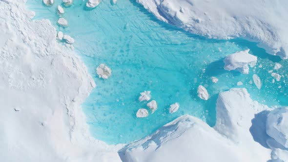 Antarcica Iceberg Turquoise River Top Down View