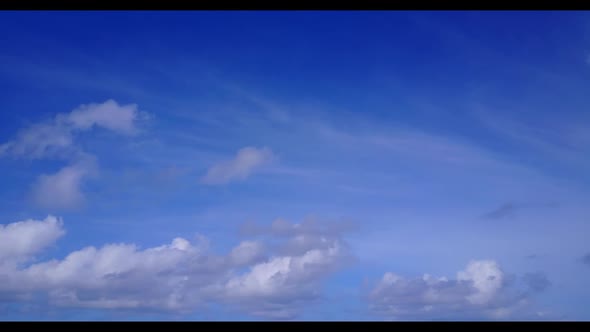 Aerial panorama of marine shore beach adventure by blue lagoon with white sand background of a dayou