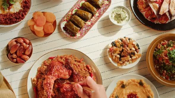 Kabsa Hummus Dolma Maqluba Tabbouleh Top View Middle Eastern National Traditional Food on Table