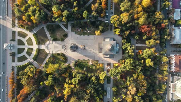 Aerial drone view of Chisinau downtown at sunset. Vertical view of central park