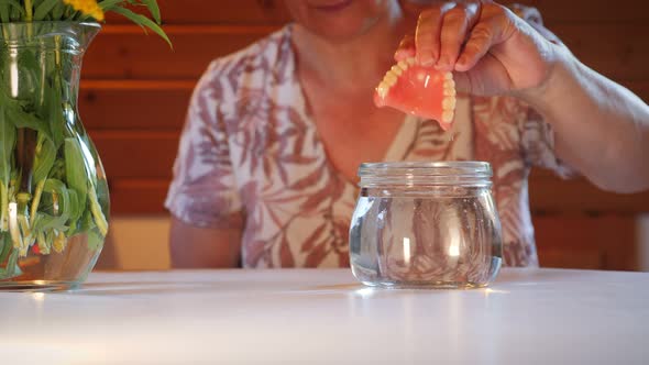 Removable jaw in a glass. Dental care