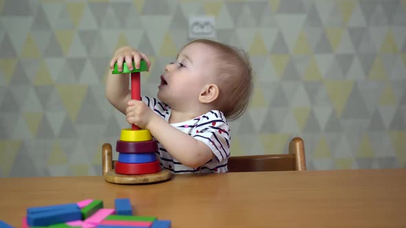 Preschool Girl Playing with Educational Toys.