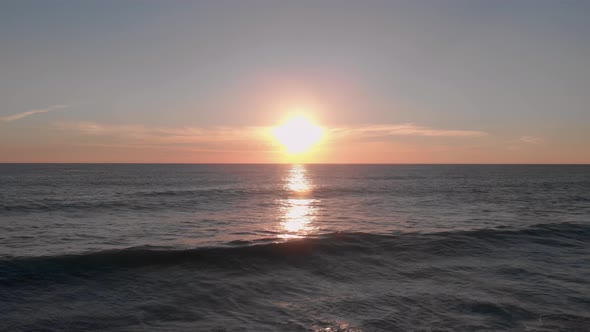 Colourful seaside at sunset time. Beautiful evening sunset in sky over sea.