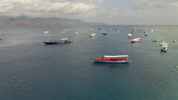 Aerial flyover many parking boats on water during covid19 pandemic.No tourists,no holiday,no travel.