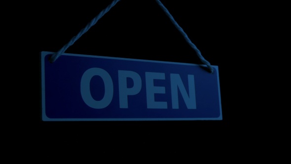 Passing Open Sign At Night