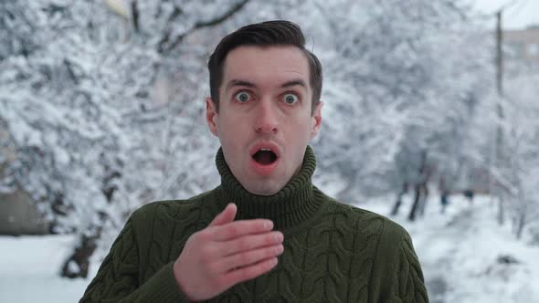 Shocked Young Male Saw Something Terrible Fearing for His Life Outdoor at Wintertime