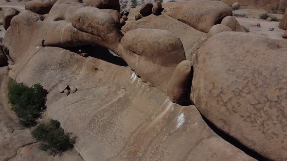 People are exploring the amazing round rocks in Erongo region, Namibia