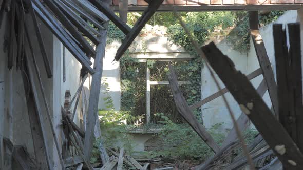 A broken window in a collapsed building