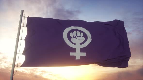 Feminist Pride Flag Waving in the Wind Sky and Sun Background