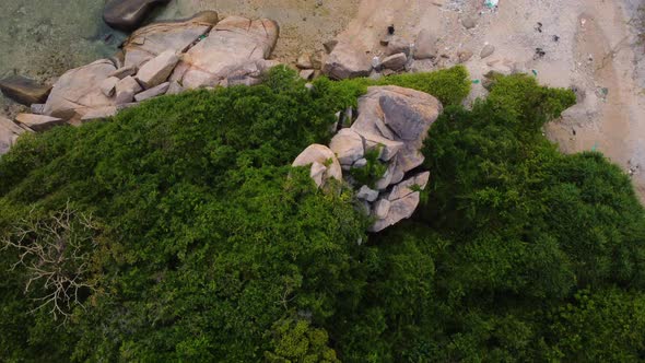 Ecological footprint of humans on pristine nature - polluted beach; drone