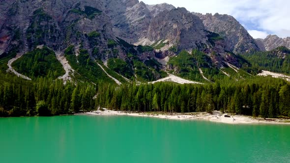 Lake Braies or Pragser Wildsee in South Tyrol Italy, Aerial drone pedestal lowering shot