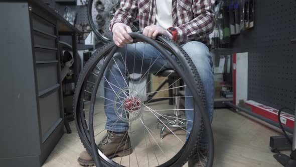 Replacing a Bicycle Tube and Tire in a Bicycle Shop