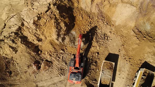 Excavator With Trucks