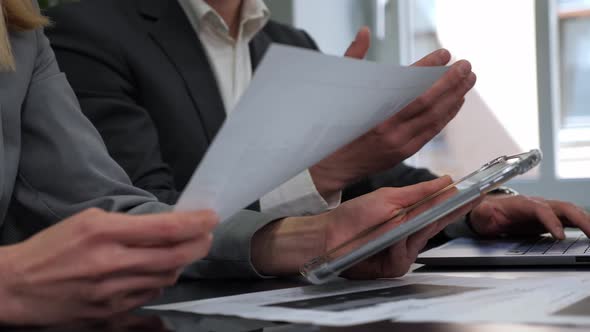 Close Up Hands Holding Documents Business People Group Meeting in Office Room