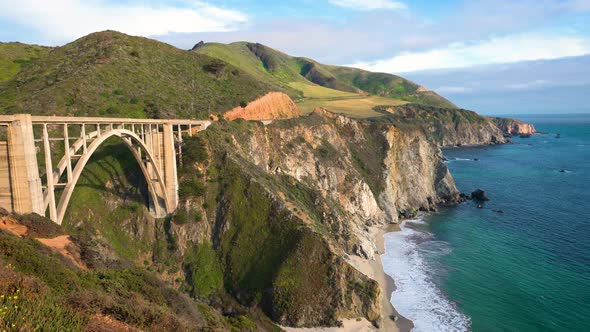 Pan Right of Bixby Bridge and Pacific Ocean Near Big Sur in California USA