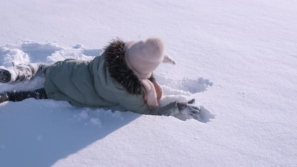 Teen Play in White Snow