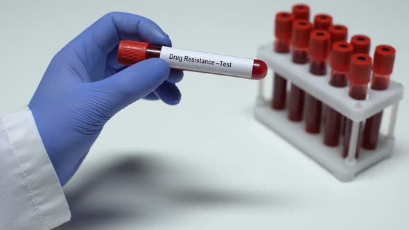 Drug Resistance, Doctor Shows Blood Sample in Tube, Lab Research, Health Checkup