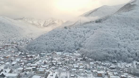 Krasnaya Polyana Village Surrounded By Mountains Covered with Snow