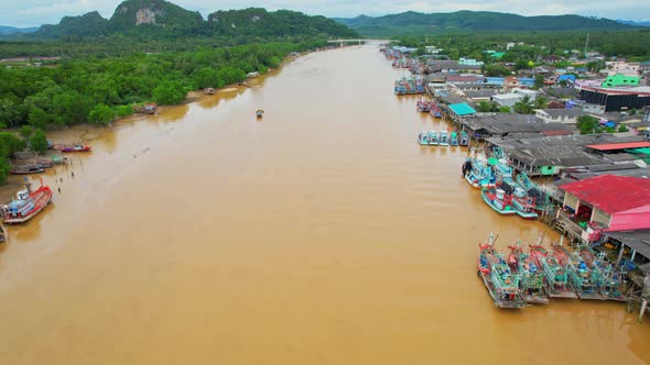 An aerial view over the river, fishing villages and fishing boats