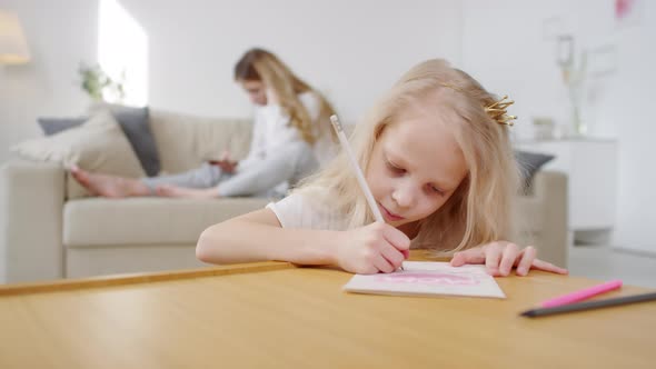 Sequence of Cute Girl Making Mothers Day Card for Happy Mother