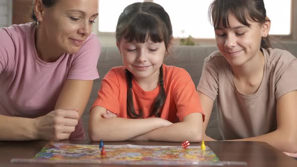 Family Playing with Dice