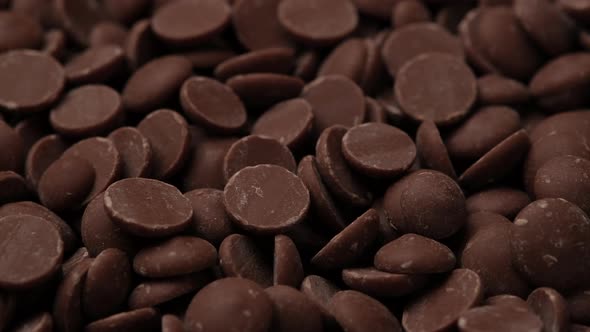 milk chocolate chips close up. confectionery concept