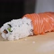 Chef's hands rolling a sushi roll. Sushi making process. Rolls the sushi roll	 - VideoHive Item for Sale