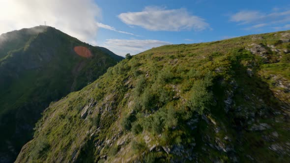 Fpv Drone Flight Over Picturesque Mountain Ridge Grazing Wild Goats